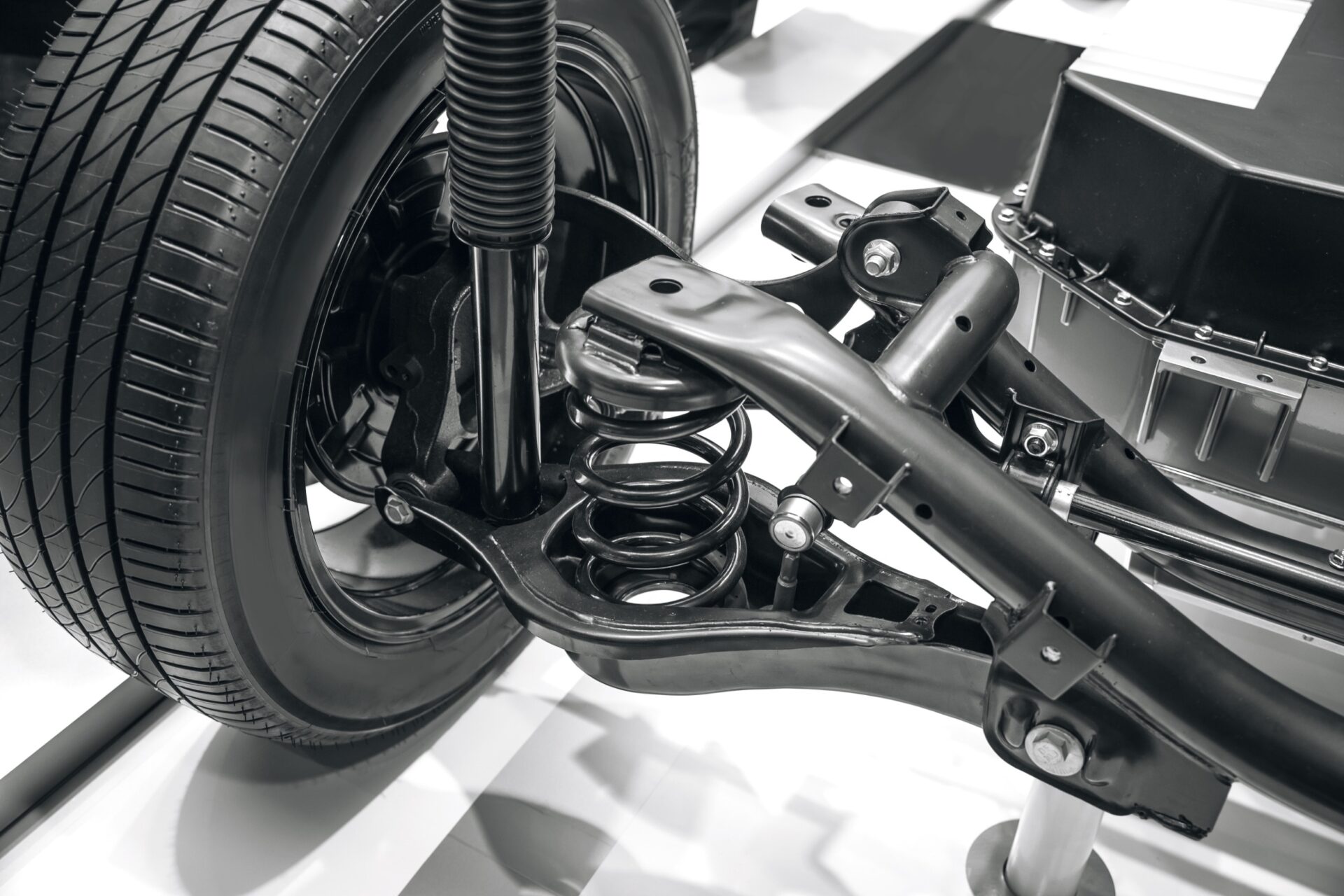 Close up shot of a car suspension with a shock absorber